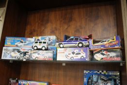 A COLLECTION OF BOXED MODEL POLICE EMEREGENCY VEHICLES ETC.