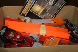 A COLLECTION OF PLASTIC TRACK, CARS AND A STEPHENSON'S ROCKET PAIR OF Y POINTS