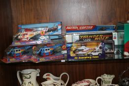 A QUANTITY OF BOXED MODEL HELICOPTERS, EMERGENCY VEHICLES ETC.