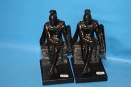 A PAIR OF METAL BOOKENDS