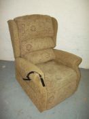 A FABRIC RISE RECLINER CHAIR