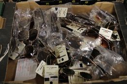 A TRAY OF SUNGLASSES