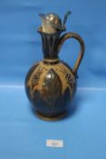 A ROYAL DOULTON LIDDED JUG