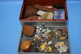 A METAL CASH BOX AND CONTENTS