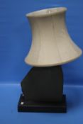 A HEAVY BASED TABLE LAMP