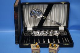 A CASED DESSERT SET TOGETHER WITH TWO BOXED BROOCHES AND WILLIAM MAKEPIECE THACKERY BOOK - '