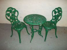 A CAST ALUMINIUM THREE PIECE VINTAGE GARDEN TABLE SET, ONE TABLE AND TWO CHAIRS A/F