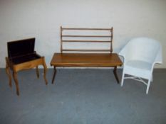 FOUR ITEMS TO INCLUDE AN ERCOL PLATE RACK, A RETRO TEAK COFFEE TABLE, A LOOM CHAIR AND A PIANO STOOL