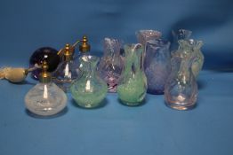 A QUANTITY OF COLOURED GLASS JARS AND PERFUME BOTTLES TO INCLUDE CAITHNESS