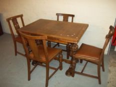 A DRAWER LEAF OAK DINING SET - MID 20TH CENTURY