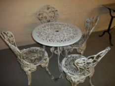 A FIVE PIECE CAST ALUMINIUM GARDEN PATIO SET, ONE TABLE AND FOUR CHAIRS