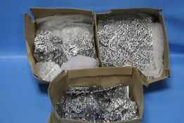 A QUANTITY OF WHITE METAL BELT BUCKLES