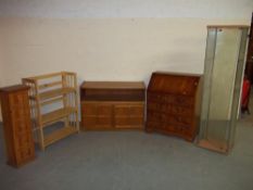 FIVE ITEMS TO INCLUDE A YEW WOOD BUREAU, A PARKER KNOLL WIDE LOW BOOKCASE, A FOLDING BOOKCASE ETC.