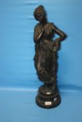 A LARGE BRONZED METAL CLASSICAL FIGURINE