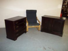 THREE ITEMS - A CHEST OF DRAWERS, A LOW TWO DOOR UNIT AND AN IKEA POANG CHAIR
