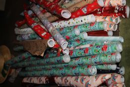 A QUANTITY OF ROLLS OF GIFT WRAP
