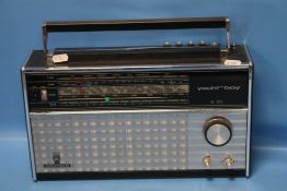 A 1970S GRUNDIG YACHT-BOY 210 LW/MW/SW/FM TRANSISTOR RADIO