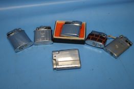 A COLLECTION OF VINTAGE CIGARETTE LIGHTERS