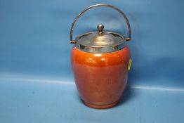 A MOORCROFT ORANGE LUSTRE BISCUIT BARREL WITH EPNS MOUNTS, IMPRESSED MARKS TO UNDERSIDE