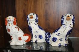 THREE STAFFORDSHIRE STYLE DOGS
