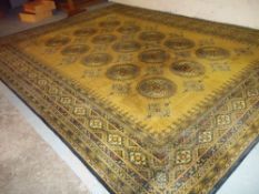 A LARGE VINTAGE RUG, 365 x 275 cm
