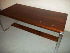 A ROSEWOOD COFFEE TABLE