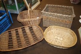 A COLLECTION OF WICKER BASKETS