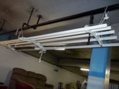 A CEILING MOUNTED CLOTHES AIRER