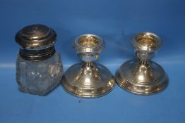 A PAIR OF HALLMARKED SILVER DWARF CANDLESTICKS TOGETHER WITH A HALLMARKED SILVER TOPPED JAR