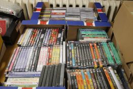 THREE TRAYS OF CDS AND DVDS, (TRAYS NOT INCLUDED)