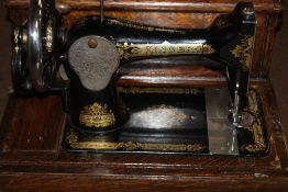 AN ANTIQUE SINGER SEWING MACHINE