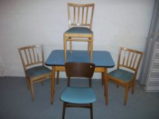 A RETRO KITCHEN TABLE AND THREE CHAIRS PLUS AN EXTRA CHAIR