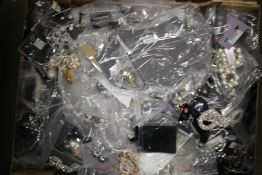 A TRAY OF NEW COSTUME JEWELLERY