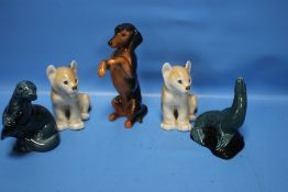 A COLLECTION OF CERAMIC ANIMALS TO INCLUDE POOLE