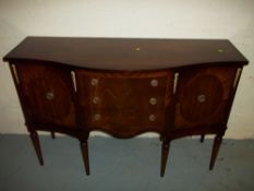 A SERPENTINE FRONTED MAHOGANY SIDEBOARD