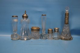 A COLLECTION OF MAINLY SILVER TOPPED ITEMS TO INCLUDE VASES, DECANTER ETC.