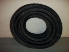A ROLL OF 100MM DIAMETER LAND DRAINAGE PIPE
