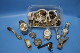 A QUANTITY OF COSTUME JEWELLERY, WRIST WATCHES ETC.