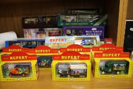 A QUANTITY OF BOXED TOY VEHICLES TO INCLUDE RUPERT, LLEDO VE DAY SPECIAL EDITION, LLEDO NORTH