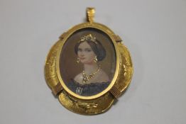 AN 18 CT GOLD FRAMED BROOCH WITH MINIATURE PORTRAIT INSERT