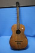 AN ACOUSTIC GUITAR, NO MAKER'S NAMECondition Report:WELL WORN