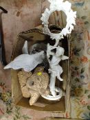 A CAST GARDEN CHERUB FIGURE TOGETHER WITH A FAIRY AND MONKEY BIRD HOUSE