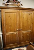 A MODERN DOUBLE HONEY PINE WARDROBE H-196 CM W-163 CM