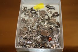 A COLLECTION OF SILVER AND WHITE METAL CHARMS TO INC HALLMARKED EXAMPLES (APPROX 73)
