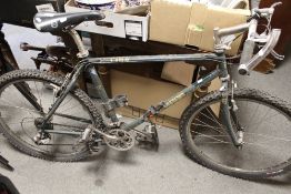 AN ORANGE C16R BICYCLE A/F