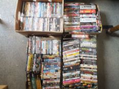 FOUR TRAYS OF DVDS
