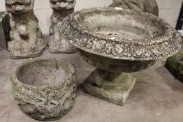 A GARDEN PLANTER ON BASE TOGETHER WITH A SMALLER FLORAL EXAMPLE