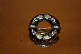 A VICTORIAN TORTOISESHELL PIQUE BROOCH