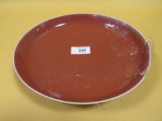 A CHINESE SANG DE BEOUF DISH' with six character mark to base' A/F' Dia 22.5 cmCondition Report: