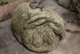 A PARASOL BASE IN THE FORM OF RABBITS